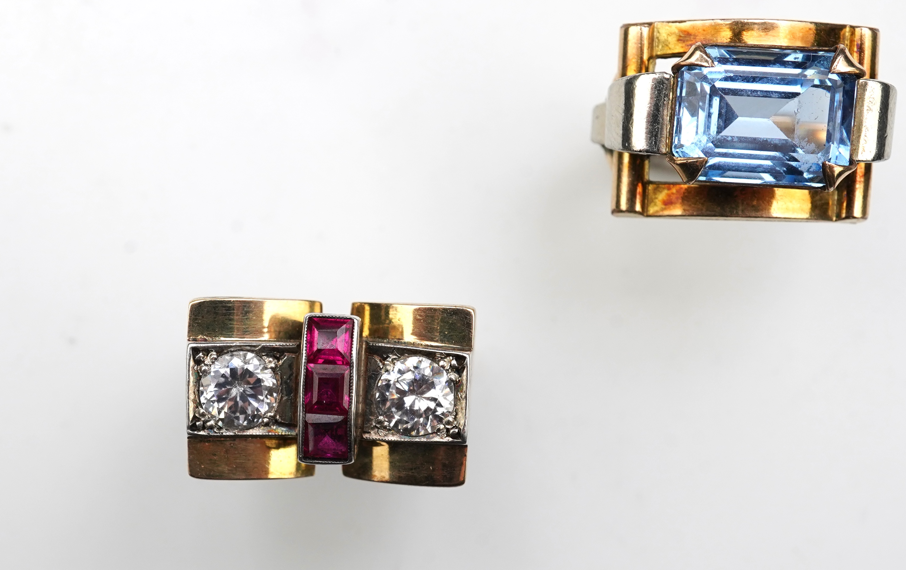 Two Retro synthetic stone and paste cocktail rings, 1940s